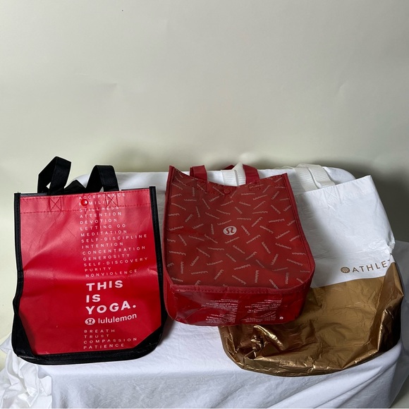 lululemon athletica Handbags - Lululemon athleta shopping bags lot of 3